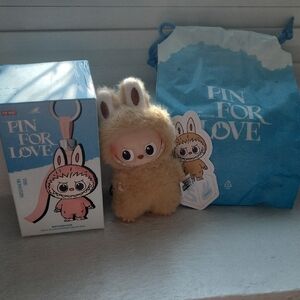 Pop Mart Beige and Pink Collectible Figure